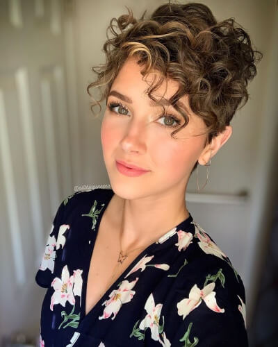 Curly Side-swept Pixie Cut with Tapered Undercut