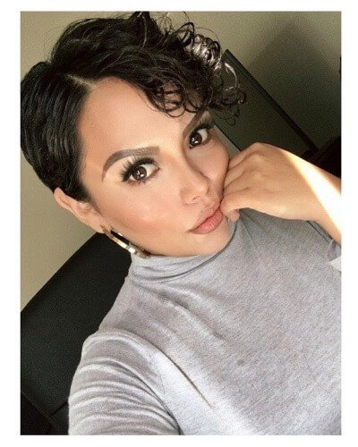 Short Slick Pixie with Long Curly Bangs