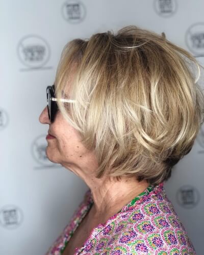 Voluminous Bob Cut with Long Layers and Babylights Short Hairstyles for Fine Hair