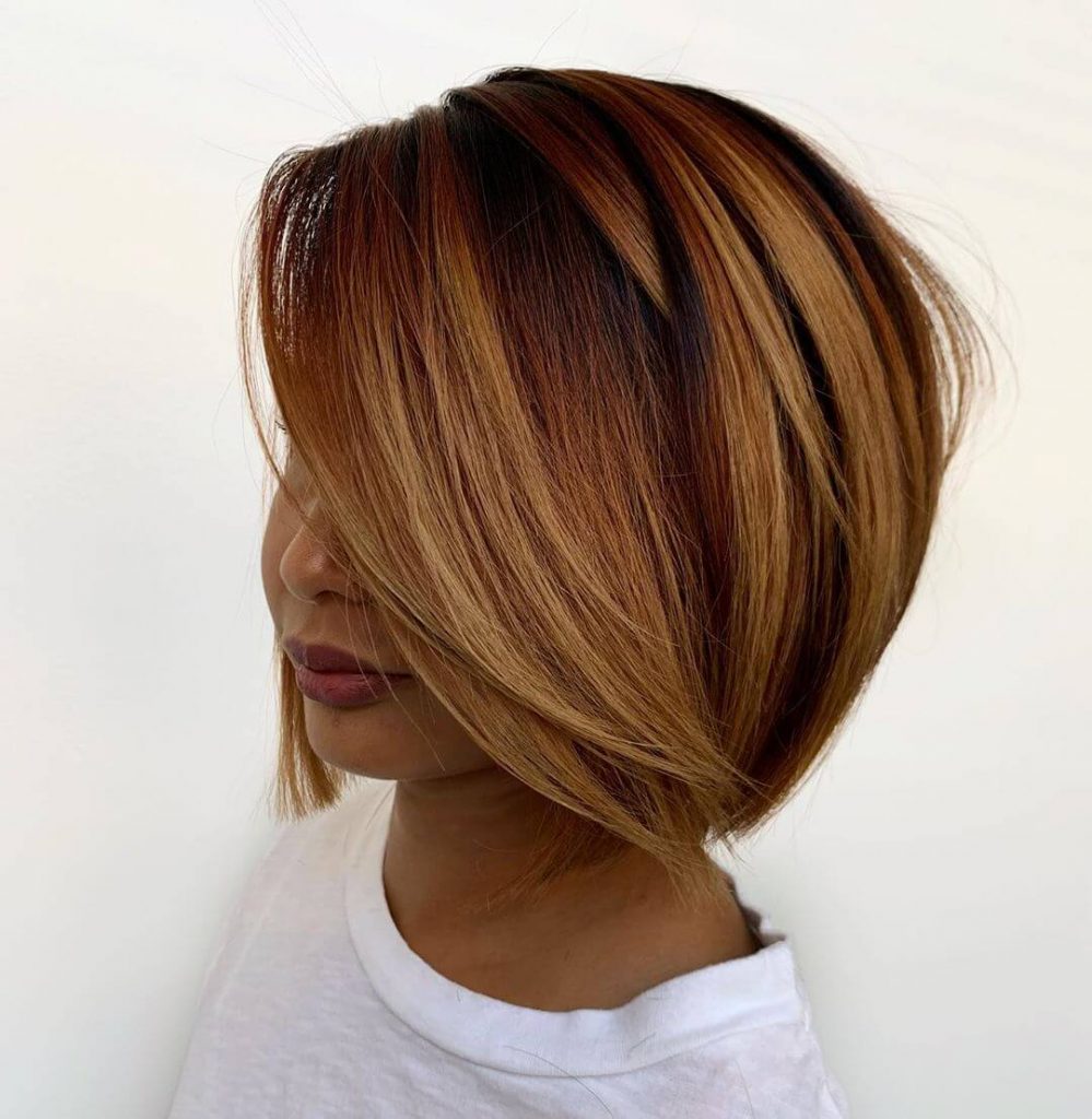 Piecey Highlights Deep Side Part Concave Bob Cut short hairstyles for oval faces