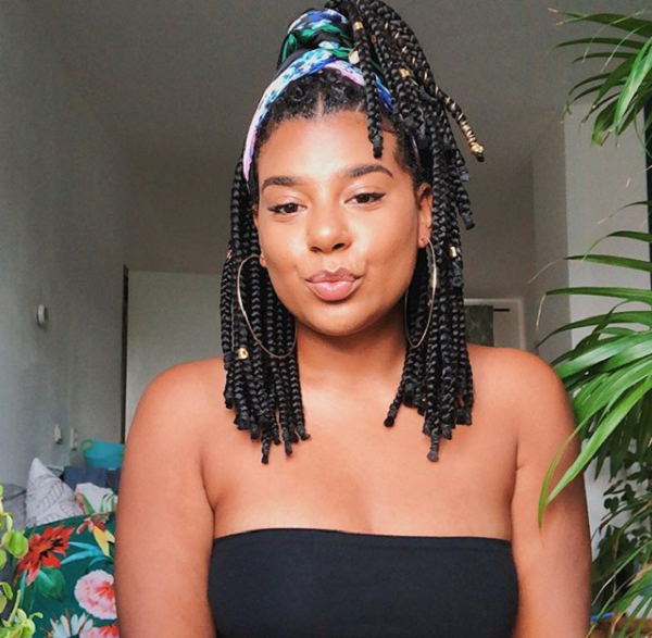 Medium-Length Box Braids with Half Up Do Hairstyle for Black Women