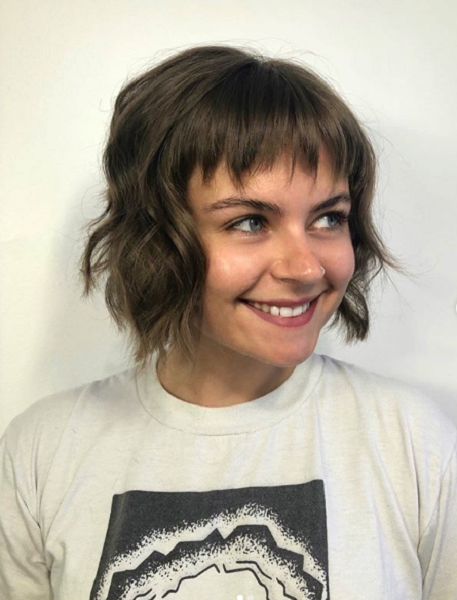 Shag Hairstyle with Feathered Bangs for Diamond Faces