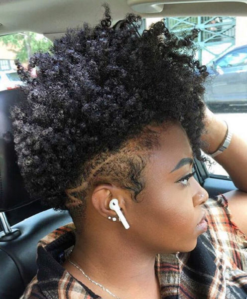 Half Shaved Afro Hairstyle