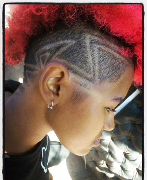 Half Shaved Curly & Colored Hairstyle with Patterns