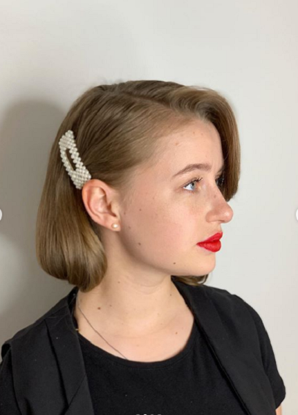 Side-Parted Romantic Retro Wedge Haircut with Hair Accessory
