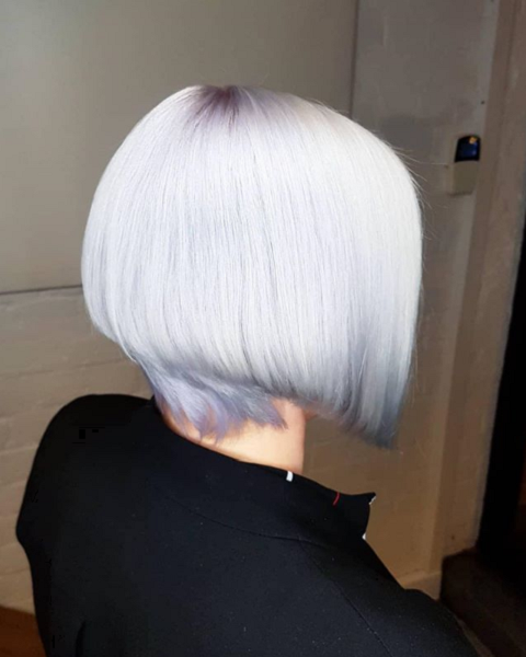 Sleek Silver & Short in the Back Wedge Haircut