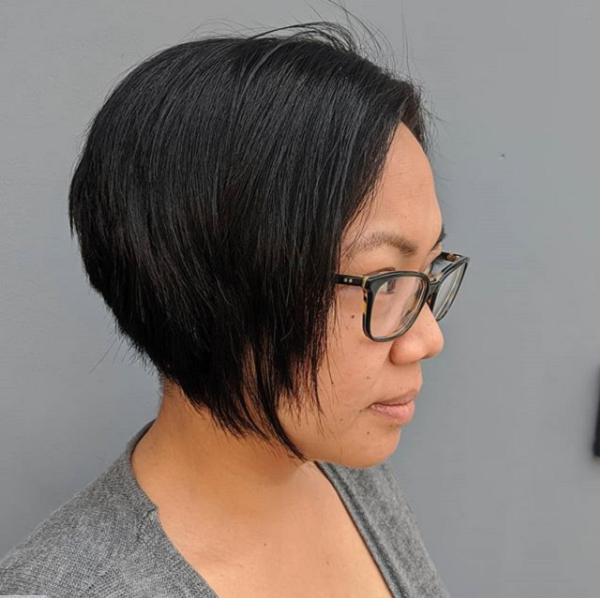 Sleek Wedge Haircut with Long Side-Parted Bangs