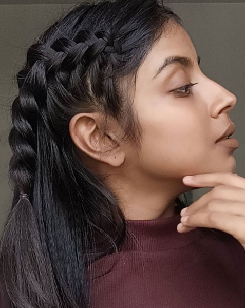 Sleek hairstyle with side braid