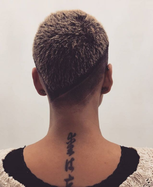 Spiky Hairstyle with Patterns on Shaved Sides and Nape