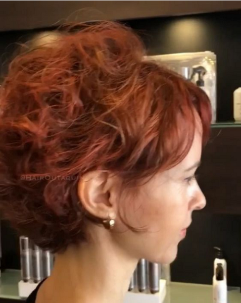 Curly Voluminous Hairstyle with Sleek Bangs