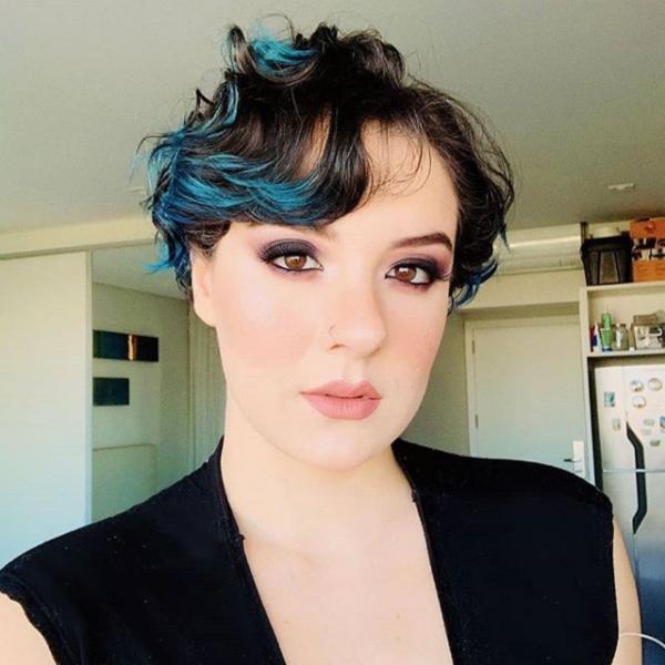 Wavy Pixie Cut with Long Side-Parted Bangs