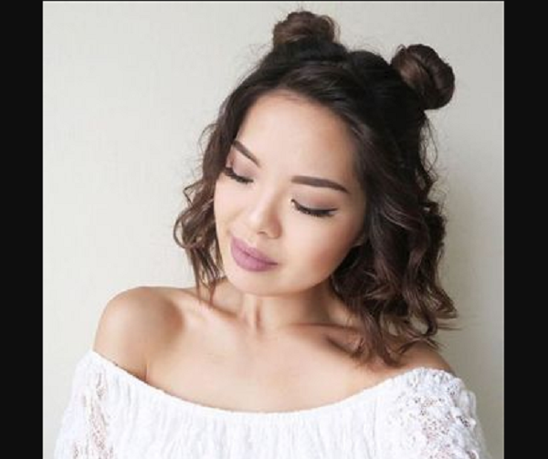 Formal Wavy Hairstyle with Space Buns