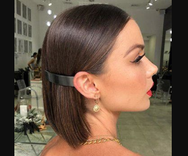 Very Sleek and Glossy Formal Short Hairstyle with Side Accessory
