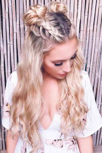Long Half Up Half Down Hairstyle with Cornrow-Like Braids and Space Buns
