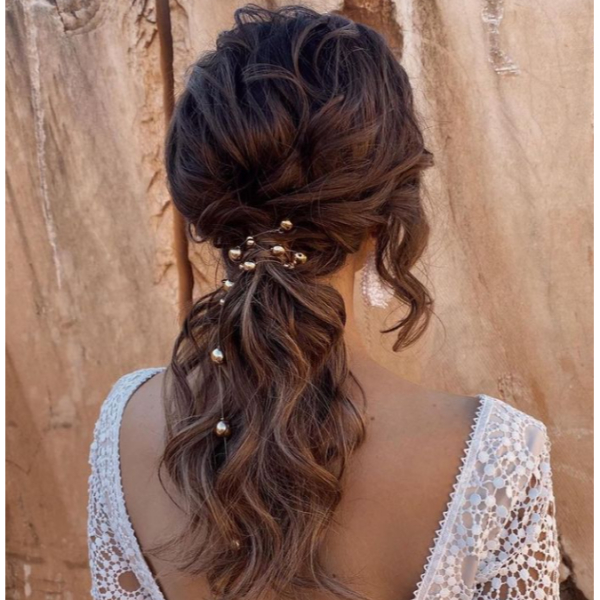 Low & Curly Ponytail With Baubles 