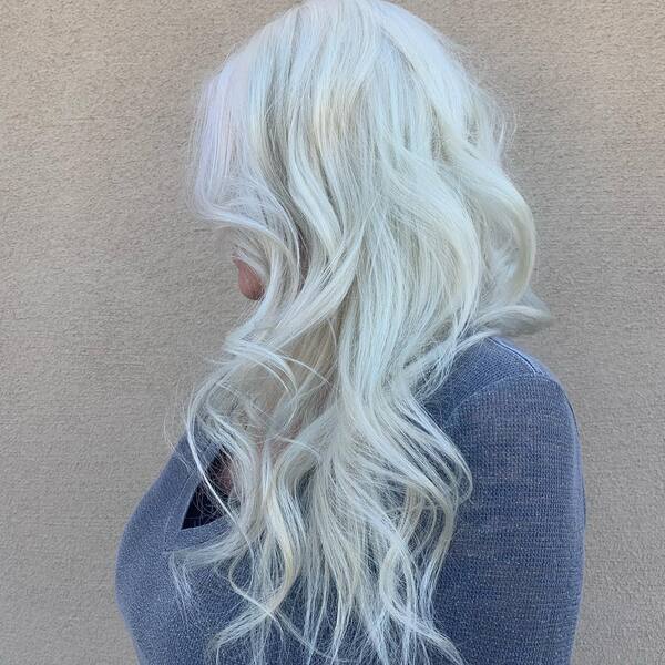 Icy Platinum Blonde Hairstyles - a lady wearing a sweater.