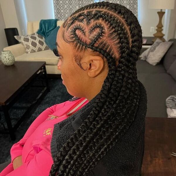 Braids Hairstyles With Heart Shape- a woman wearing a pink jacket.