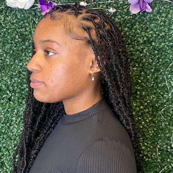 Length Soft Locs With Rounded Parts- a lady wearing a black shirt.
