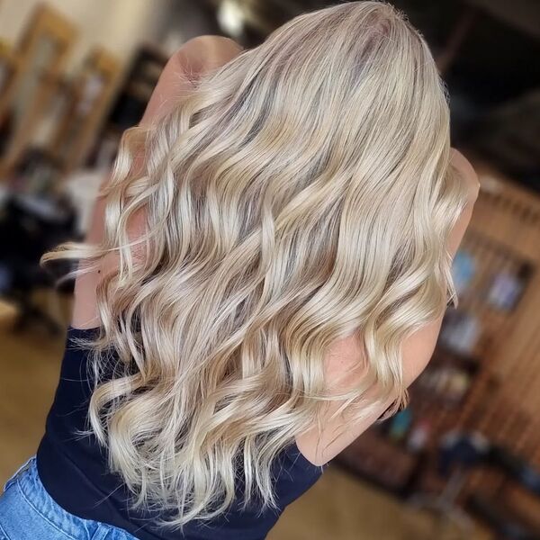 Summer Platinum Blonde Hairstyles - a girl wearing a sexy top.