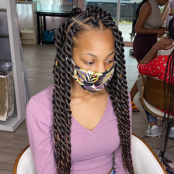 Jumbo Twists  Hairstyle - a woman with floral facemask wearing a purple longsleeve