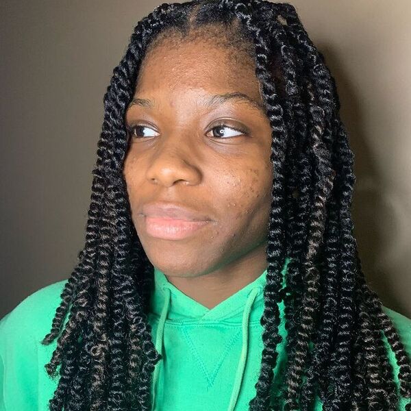 Passion Twist on a Natural Hair - a woman wearing green hooded jacket