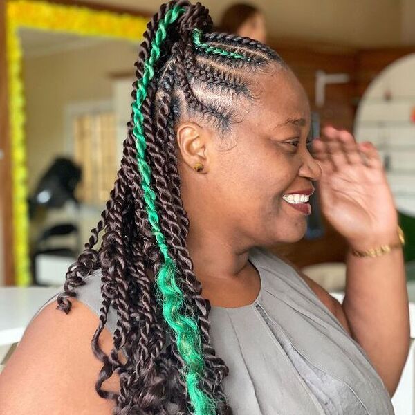 Two-Strand Twists on a Ponytail - a woman wearing a gray sleeveless blouse