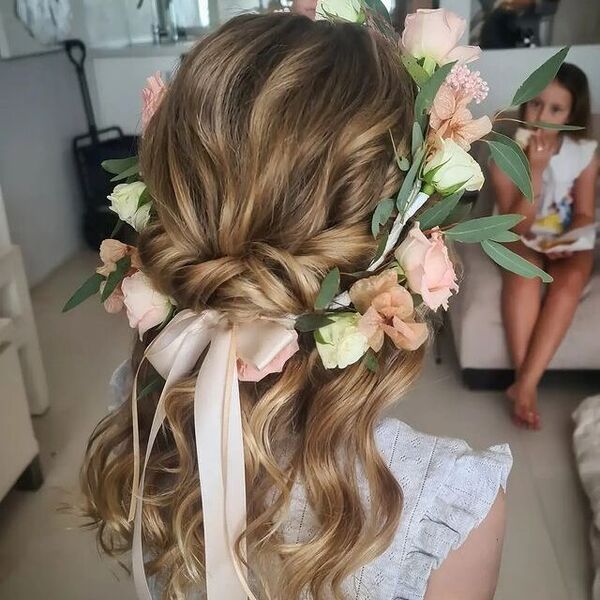 Charming Flower Crown on a Curly Hair - a woman wearing a white sleeveless blouse